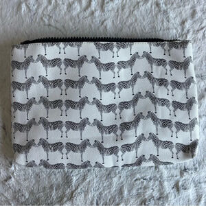 Nila Anthony Zebra Print Clutch.